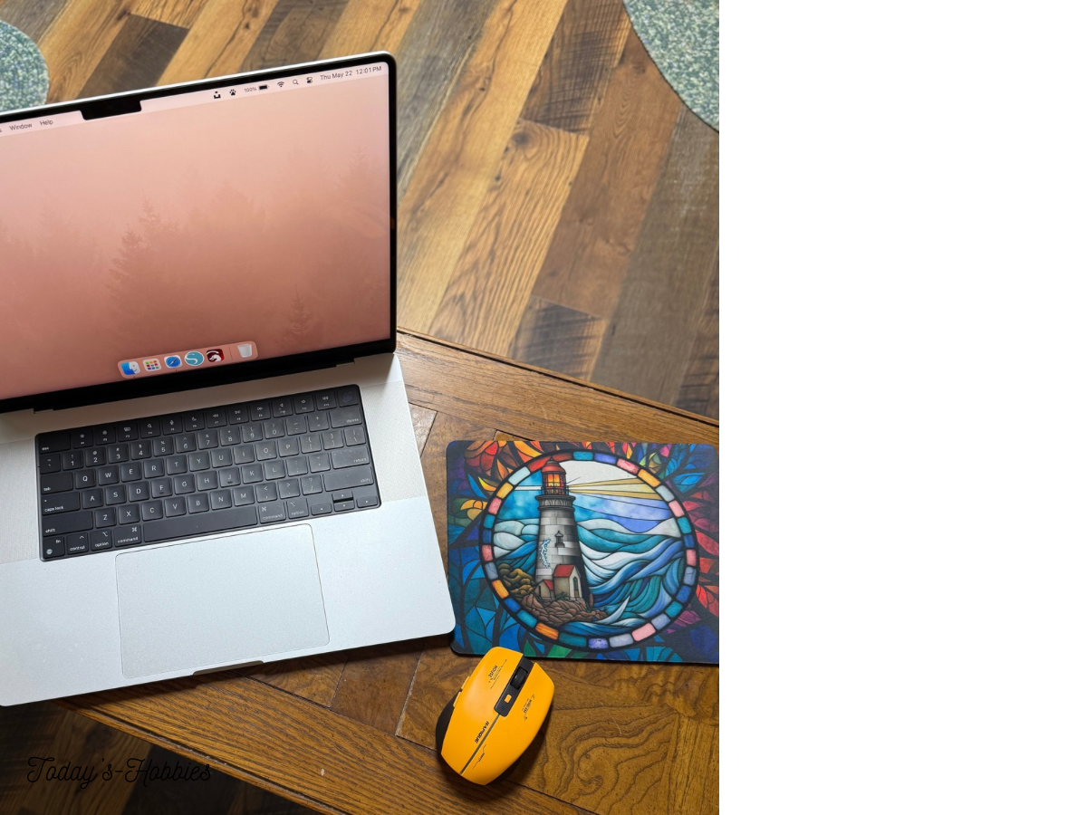 Sublimation mouse pad with lighthouse design next to laptop and yellow mouse handcrafted gift ideas by Today's Hobbies