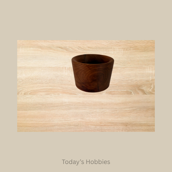 Handmade ring dish wood with smooth dark finish by Todays Hobbies on light wooden background