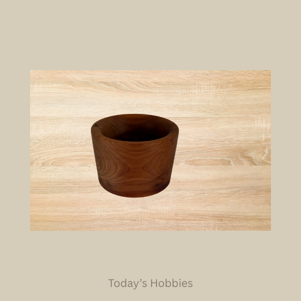 Handmade ring dish wood crafted with smooth dark wood grain for elegant jewelry storage