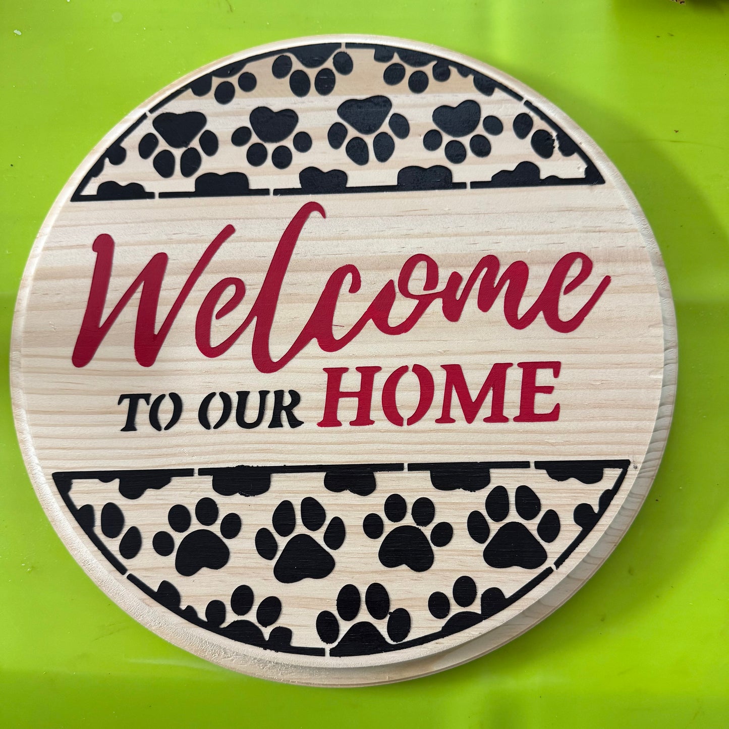 Today’s Hobbies pet themed welcome plaque made of wood with red and black paw prints