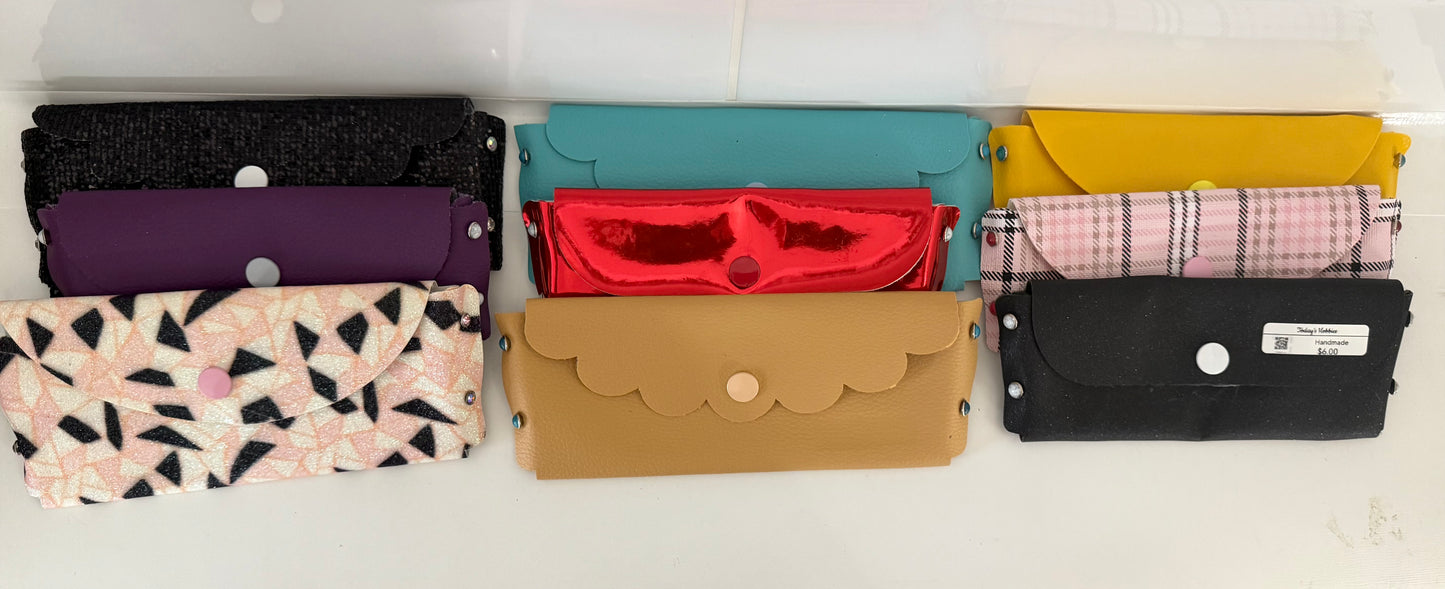 Colorful handmade glasses pouch collection in various patterns and colors made from craft leather by Today’s Hobbies