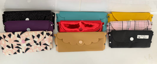 Colorful handmade glasses pouch collection in various patterns and colors made from craft leather by Today’s Hobbies
