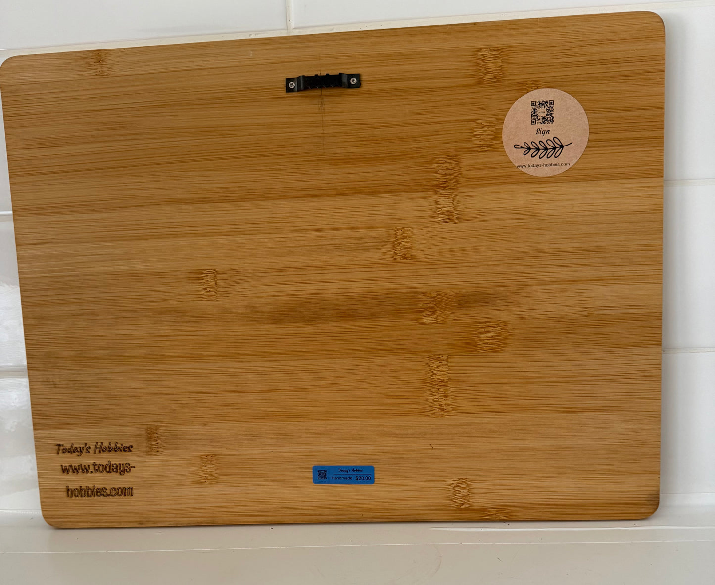 Wooden funny Christmas cutting board by Today’s Hobbies with engraved branding and smooth bamboo surface