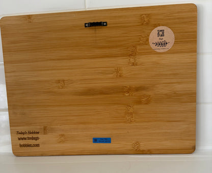 Wooden funny Christmas cutting board by Today’s Hobbies with engraved branding and smooth bamboo surface