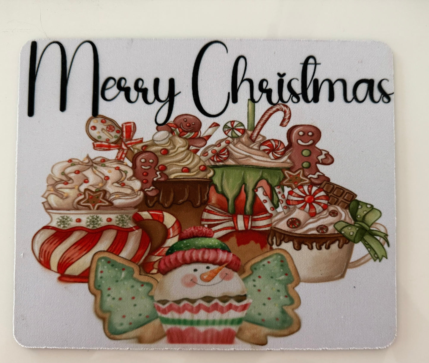 Merry Christmas sublimation design featuring festive cupcakes and holiday treats for handcrafted gift ideas