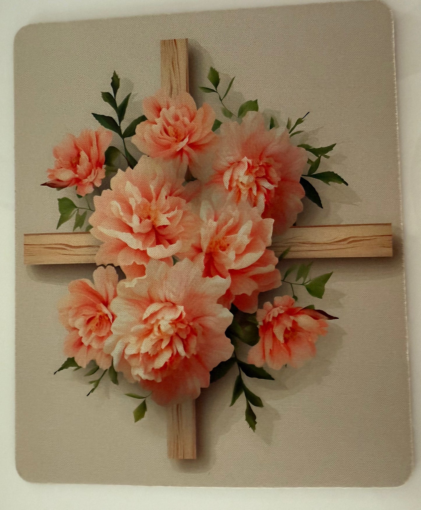 Sublimation floral design with pink flowers and green leaves on wooden cross for handcrafted gift ideas