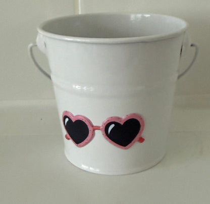 White tin bucket with heart-shaped pink sunglasses design from handcrafted home organizer set by Today’s Hobbies