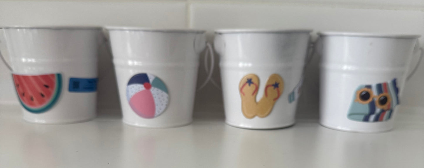 Set of Today’s Hobbies tin containers with summer-themed designs in handcrafted home organizer set