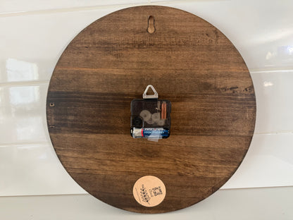 Back view of a wooden handcrafted wall clock for home decor by Today’s Hobbies showing the clock mechanism