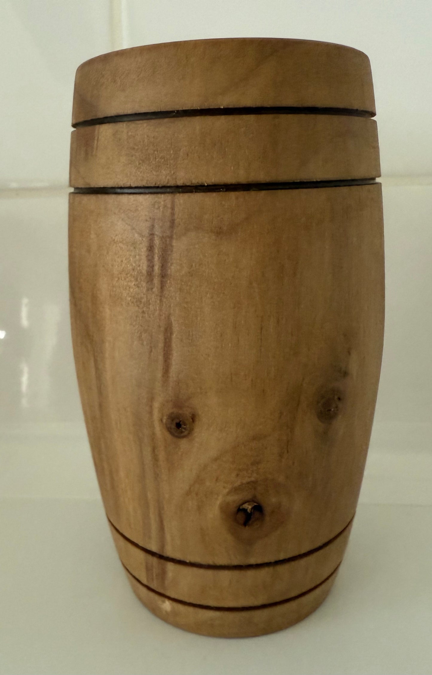 Handcrafted wooden home decor from Today’s Hobbies featuring a smooth cylindrical wood design with natural grain