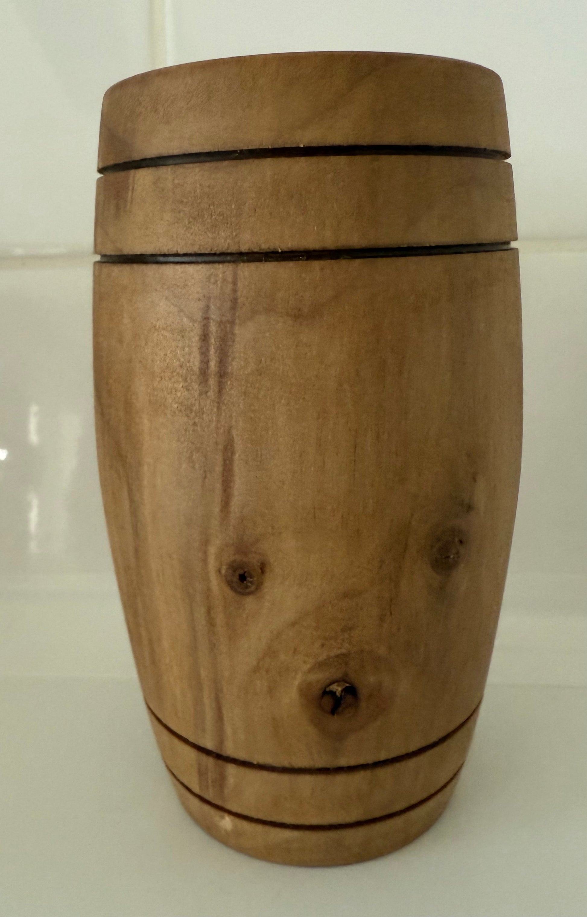 Handcrafted wooden home decor from Today’s Hobbies featuring a smooth cylindrical wood design with natural grain