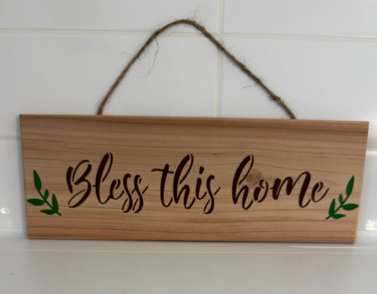 Today’s Hobbies wooden sign with Bless this home text and green leaves rustic coffee kitchen wall decor