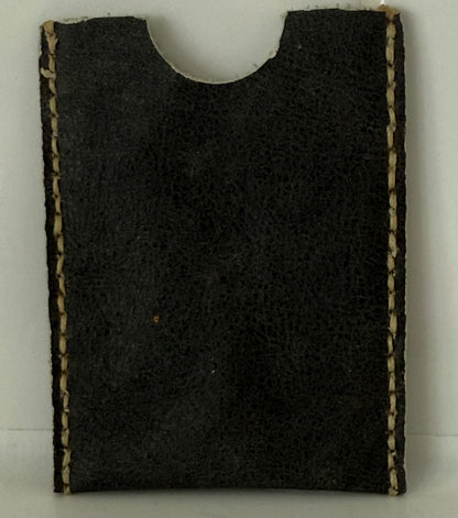 Slim leather card sleeve made of 100 percent cow hide with hand-stitched edges