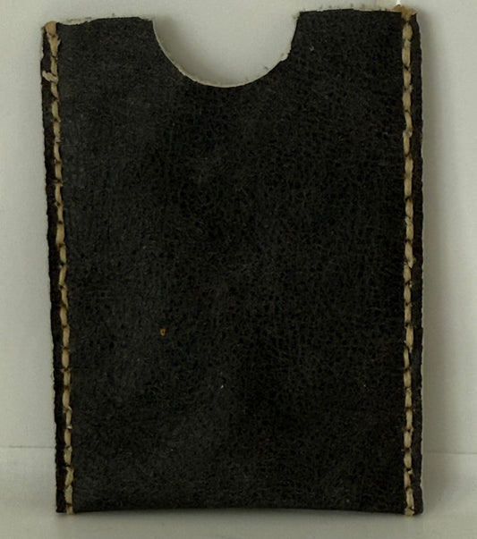 Slim leather card sleeve made of 100 percent cow hide with hand-stitched edges