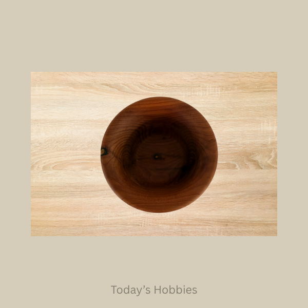Handmade ring dish wood bowl with natural grain from Todays Hobbies on light wood background