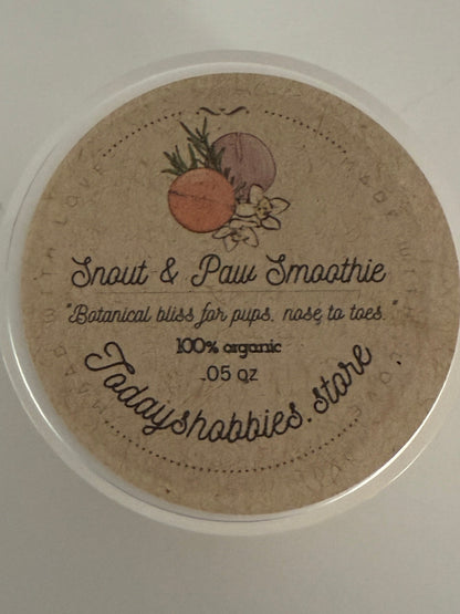 Today's Hobbies natural dog paw balm labeled Snout and Paw Smoothie with botanical ingredients in a small round container