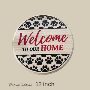 12 inch round wood pet themed welcome plaque with paw prints and Welcome to Our Home text
