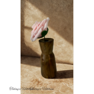 Today's Hobbies wooden vase for home decor with a pink artificial rose on textured surface